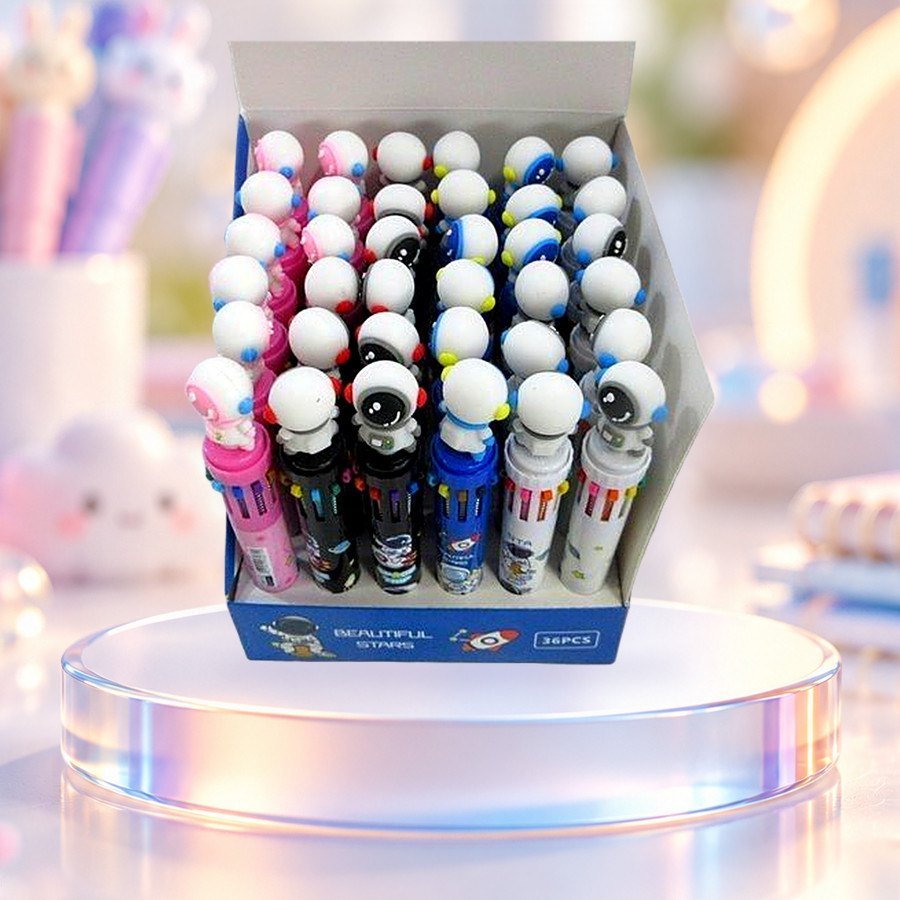 10-Colour Pen (Space Man): 10-colour pens with space man toppers in a display box, on a clear glass podium — wholesale kawaii pens from Tirth Enterprise