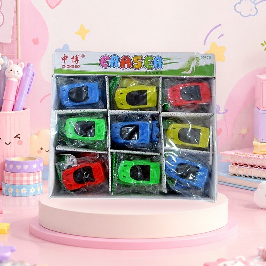 Car Eraser: race car erasers in a display tray, on a pink kawaii desk — wholesale kawaii erasers from Tirth Enterprise